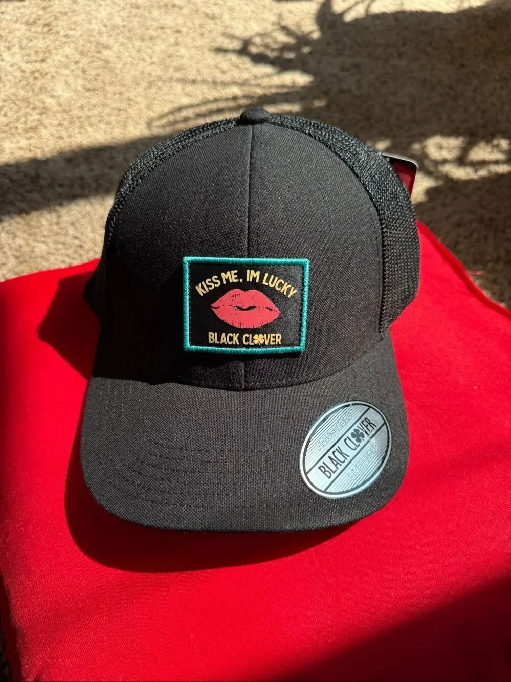 Black Clover “Kiss Me, I’m Lucky” Trucker Hat Black Mesh Snapback NWT